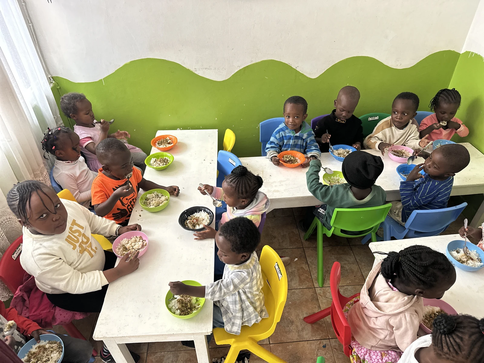 Children sharing a meal around the table