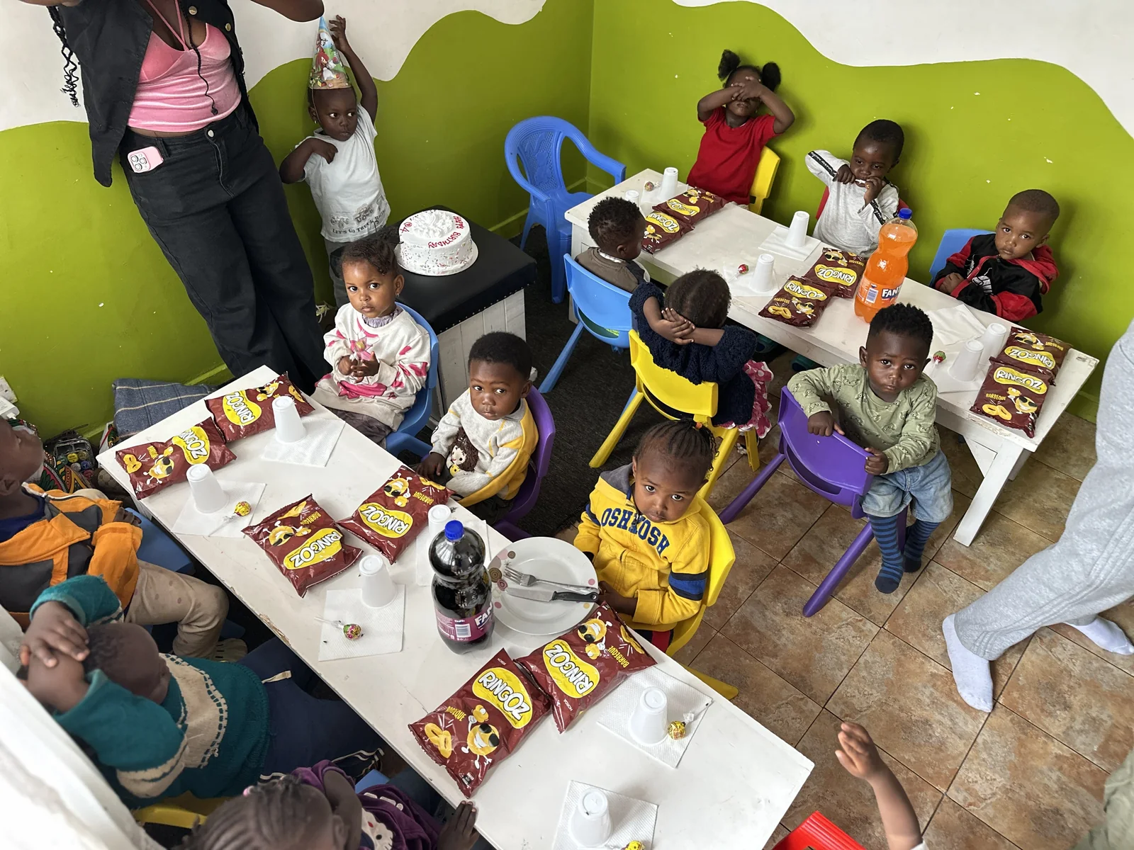 A birthday celebration photographed from above