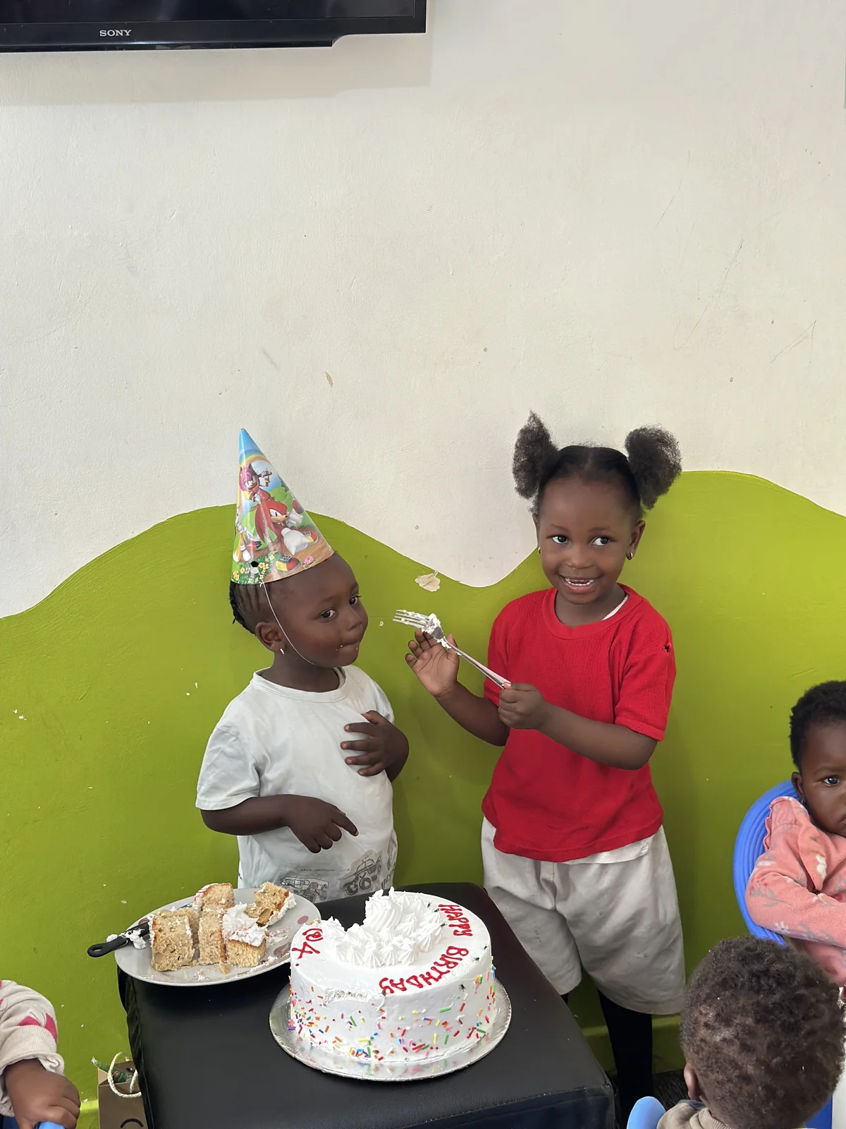 Children celebrating a birthday together