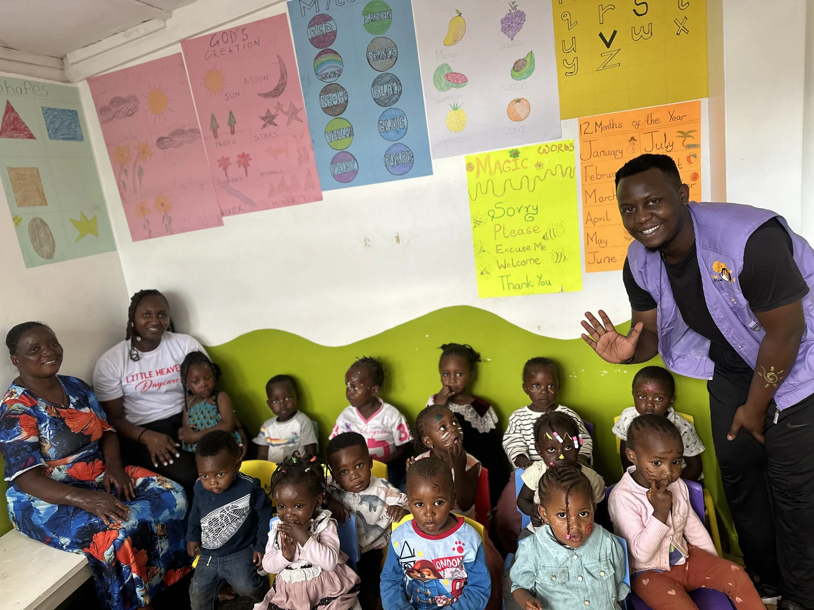 Children and a caregiver together at Little Heaven